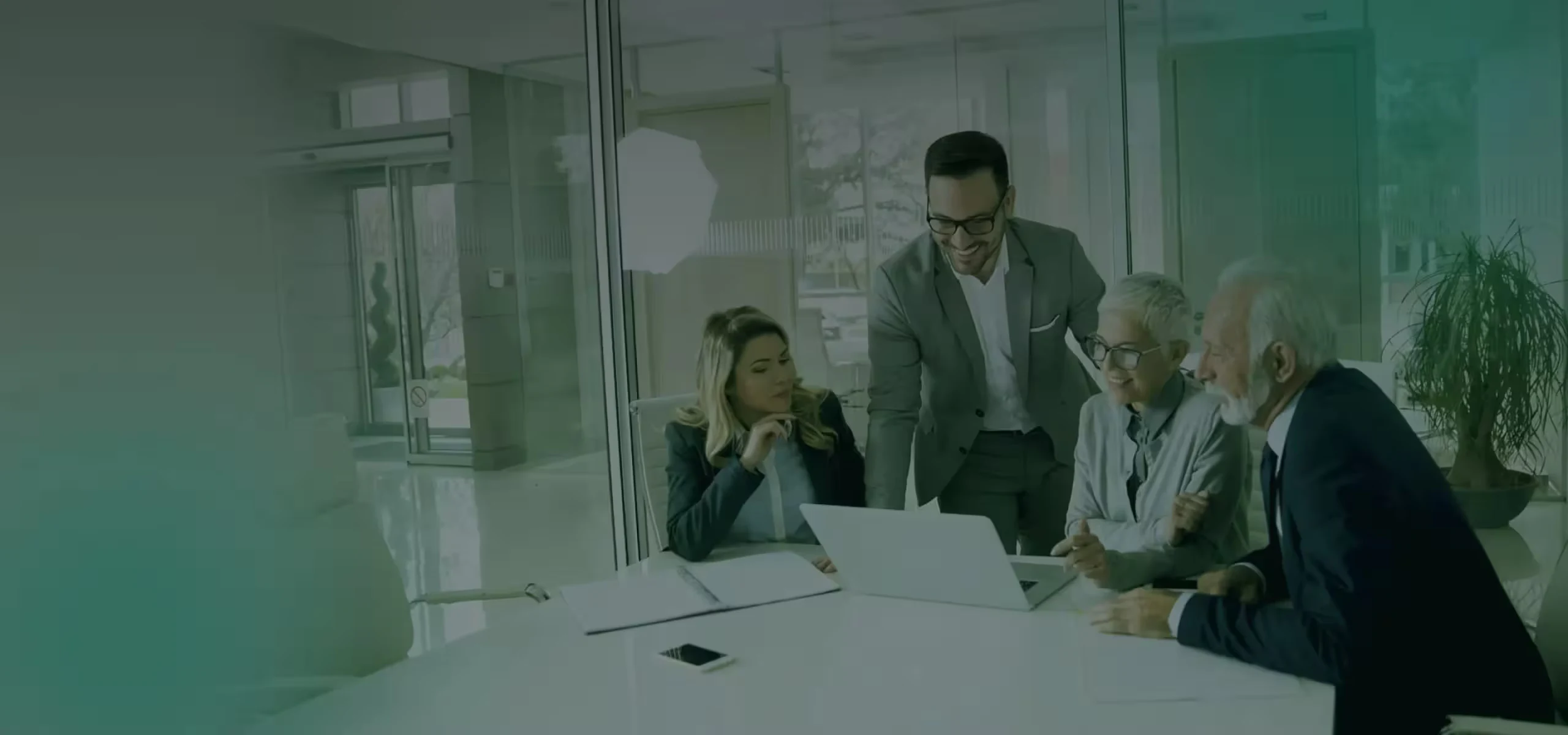 Auditors in Dubai meeting a client team to review financial statements