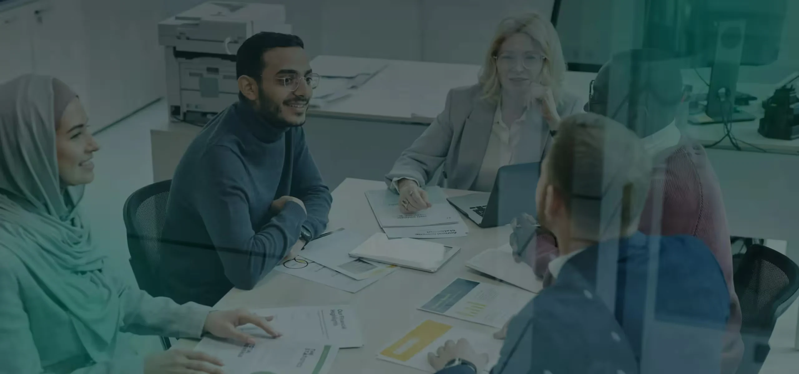 VAT and corporate tax advisers working with clients in a UAE office