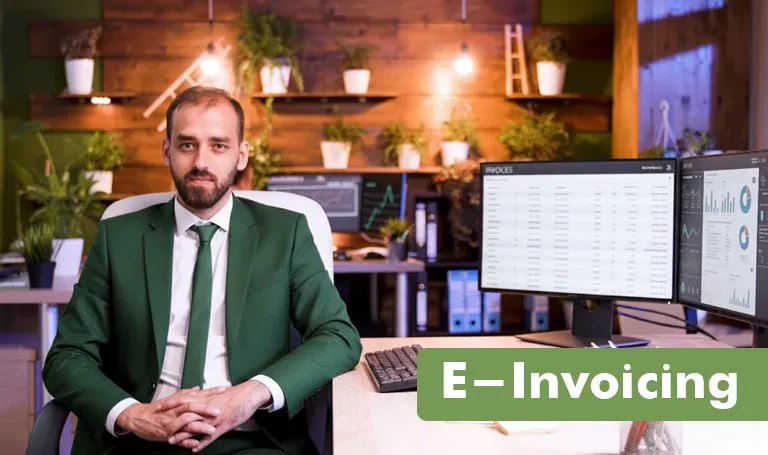 E-invoicing in the UAE: invoices on screen in a finance office