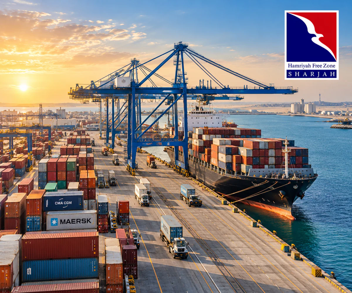 Hamriyah Free Zone (HFZA), Sharjah: port with cranes, a container ship and cargo trucks