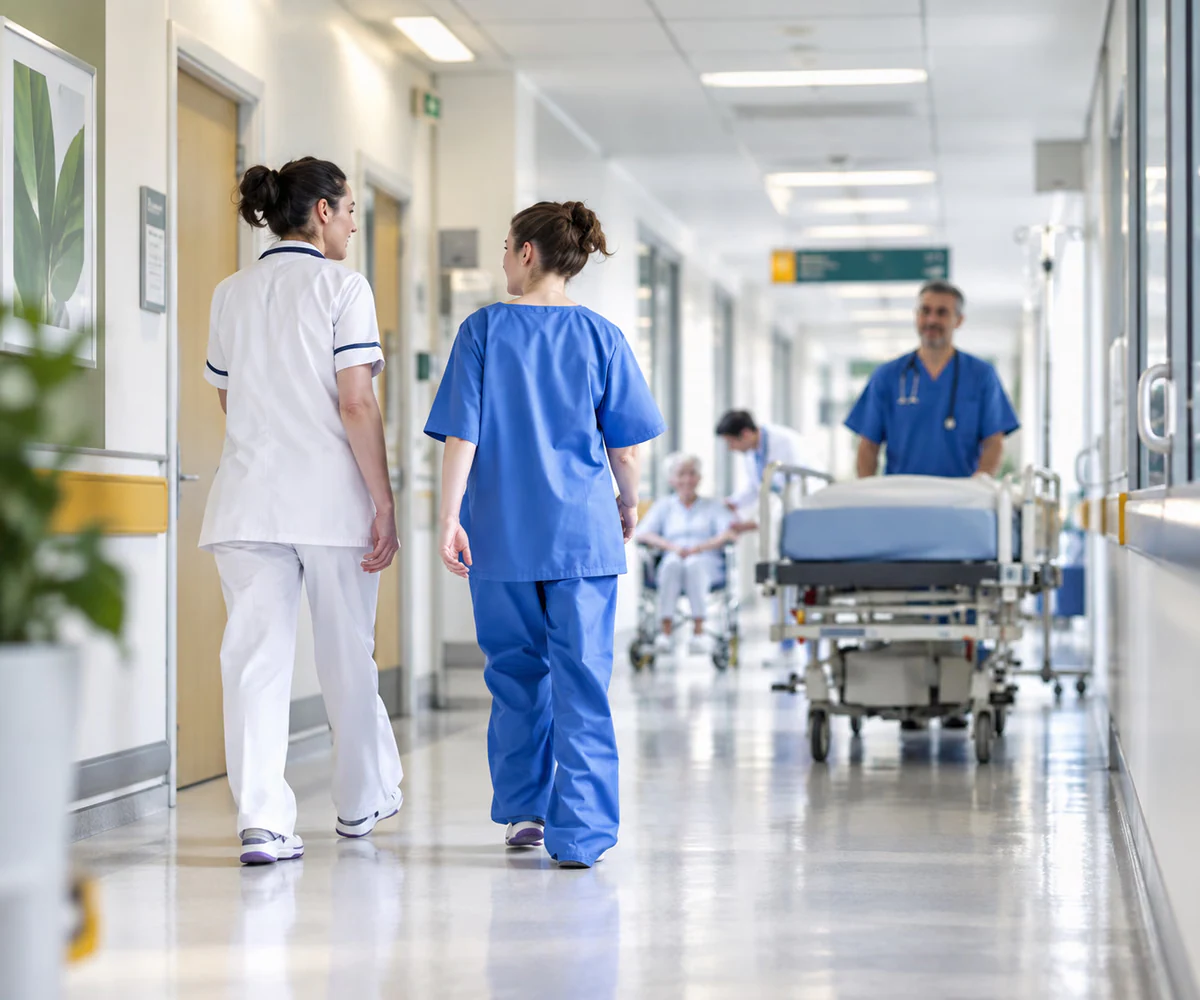 Healthcare and clinic accounting in the UAE: nurses and a doctor in a hospital corridor